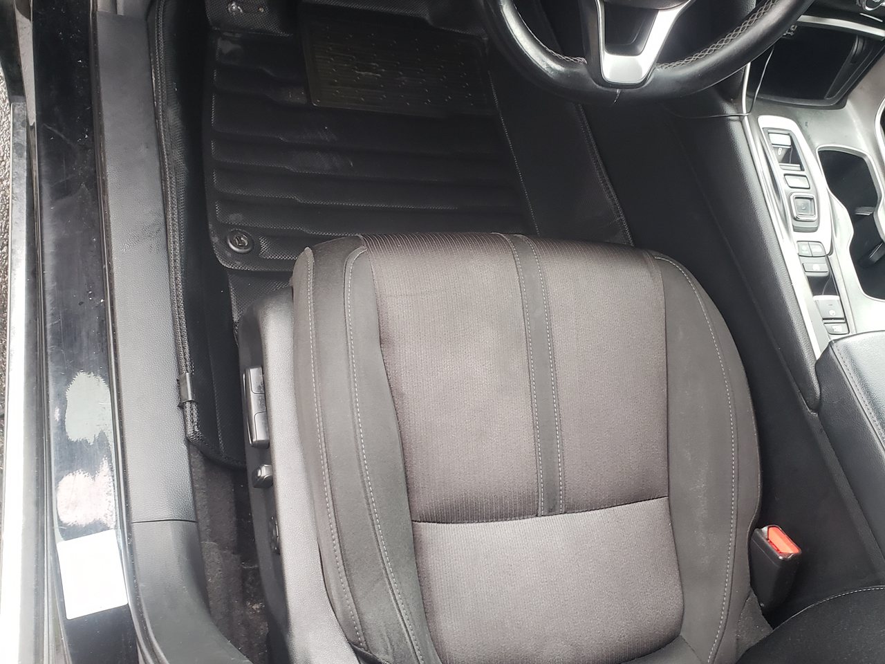 Clean driver footwell and mat after detailing