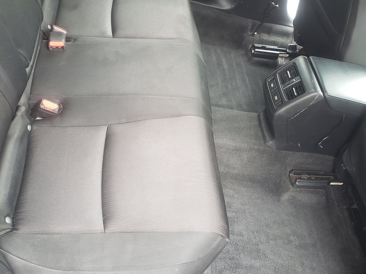 Clean rear seats and floor after detailing