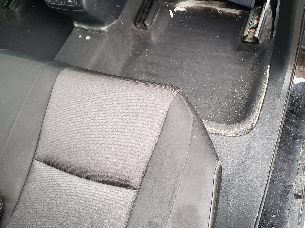 Dusty salty rear seats and floor before detailing