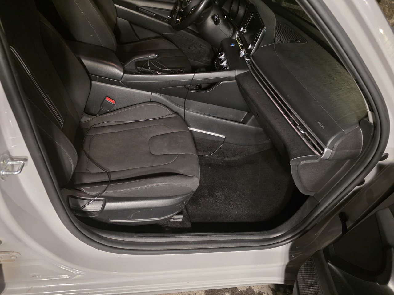 Clean front passenger footwell after detailing